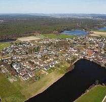 Erlangen-Kosbach, grün und stadtnah. Großzügige 2-Zimmer-Gartenwohnung. Besichtigung Samstag, 15.November 2025, von 10:00 bis 15:00 Uhr.