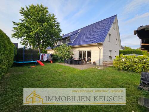 Großer Garten-Terrassenansicht - Doppelhaushälfte mit 157,80 m&sup2; in Verden zum Kaufen