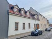 Vorderansicht - Vermietete Eigentumswohnung in Bernburg