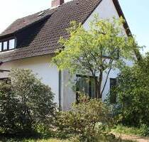 Großzügiges Einfamilienhaus mit Garage und riesigem Garten in guter Lage Tostedts