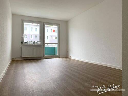 Wohnzimmer mit Balkon - 