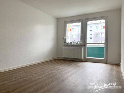 Wohnzimmer mit Balkon - 
