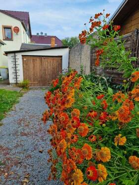 Garage mit Anbau - 4 Zimmer Mehrfamilienhaus, Wohnhaus in Schmölln-Putzkau