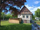 Rückseite - Einfamilienhaus mit 122,70 m&sup2; in Jößnitz zum Kaufen