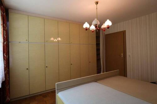 Schlafzimmer EG 1-1 - 6 Zimmer Einfamilienhaus in Gröbenzell