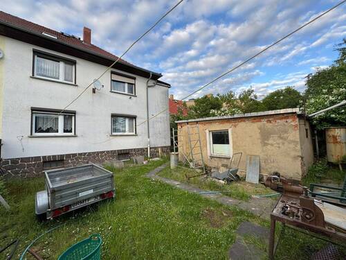 IMG-20250515-WA0001.jpg - Doppelhaushälfte mit Ausbaupotenzial