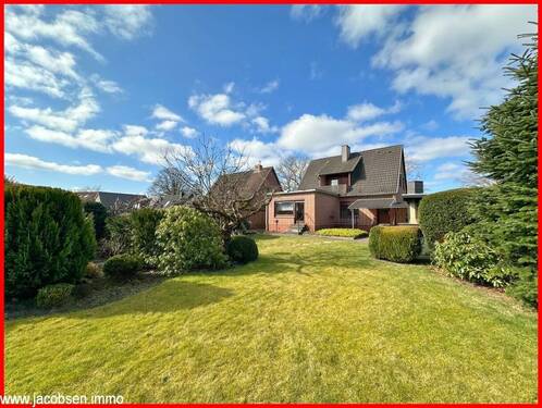 Blick aus dem Garten zum Haus - 4 Zimmer Einfamilienhaus zum Kaufen in Kropp