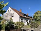 Frontansicht - 4 Zimmer Terrassenwohnung zum Kaufen in Düsseldorf