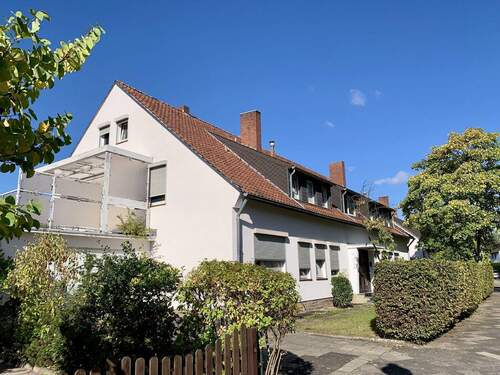 Frontansicht - 4 Zimmer Terrassenwohnung zum Kaufen in Düsseldorf
