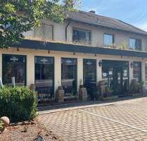 Mehrzweckimmobilie: Wohn- und Geschäftshaus mit verpachtetem Restaurant und freier Wohneinheit. - Burgebrach