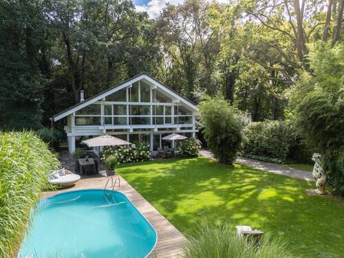 Bild 1 - Lichtdurchflutetes Wohnen im Einklang mit der Natur