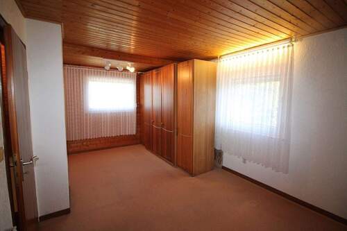 OG Schlafzimmer mit Blick in den Garten - 