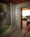 EG Bad mit Blick ins Wohnzimmer - 