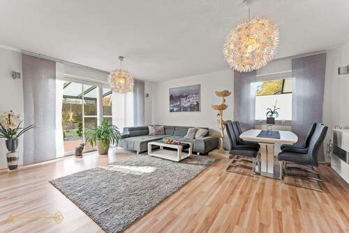 Wohnzimmer - Mehrfamilienhaus, Wohnhaus mit 264,60 m&sup2; in Wildeshausen zum Kaufen