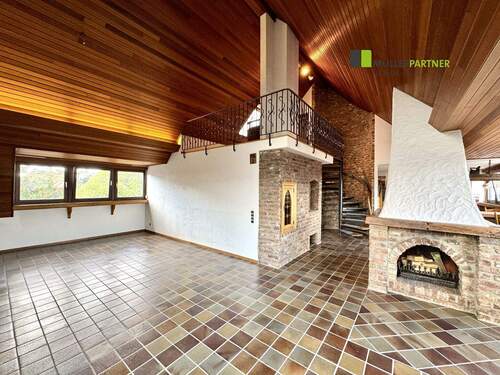 Wohnzimmer - Großzügige Dachgeschosswohnung mit Garage und sehr guter Infrastruktur in Herzogenrath-Straß!