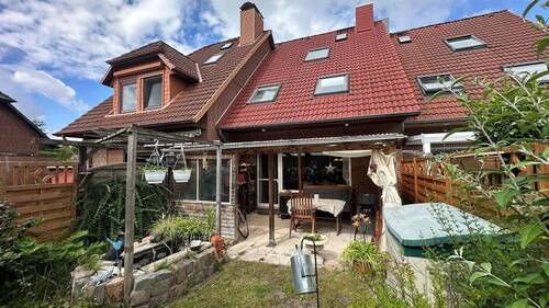Rückansicht - Solides Reihenmittelhaus mit ausgebautem Spitzboden und Keller in familienfreundlicher Lage