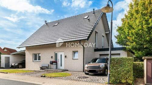 Außenansicht 2 - Charmantes Einfamilienhaus mit Wintergarten und großzügigem Grundstück
