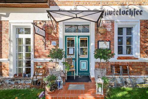 Hauseingang - Mehrfamilienhaus, Wohnhaus mit 528,00 m&sup2; in Friedland zum Kaufen