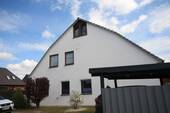 Straßenansicht - 4 Zimmer Etagenwohnung zum Kaufen in Langwedel