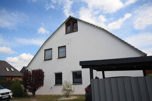 Straßenansicht - 4 Zimmer Etagenwohnung zum Kaufen in Langwedel