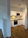 Küche - 2-Zimmer-Erdgeschosswohnung mit EBK und Terrasse