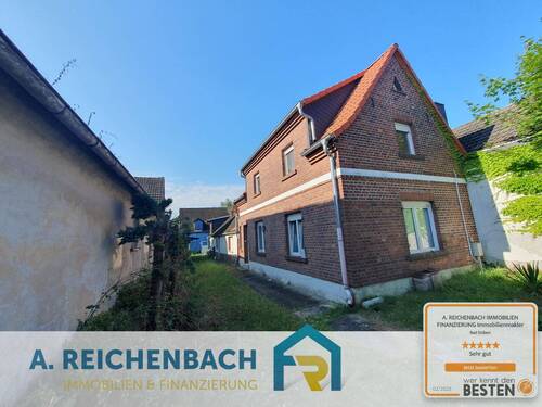 Hausansicht - Sanierungsbedürftiges Einfamilienhaus im Heide Dorf Pressel zu verkaufen!