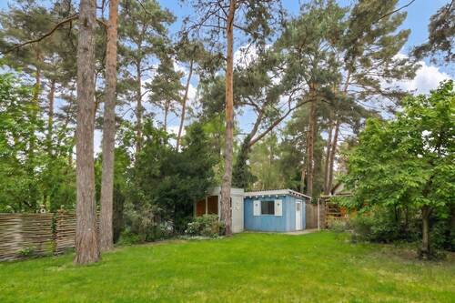 Hintere Gartenansicht - Exklusiver Rückzugsort im Grünen mit privater Panoramasauna - 