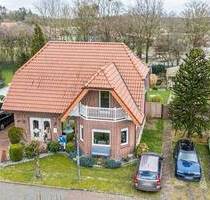 Vermietetes Einfamilienhaus mit Garage, Carport, überdachter Terrasse und großem Gartenhaus! - Niederlangen