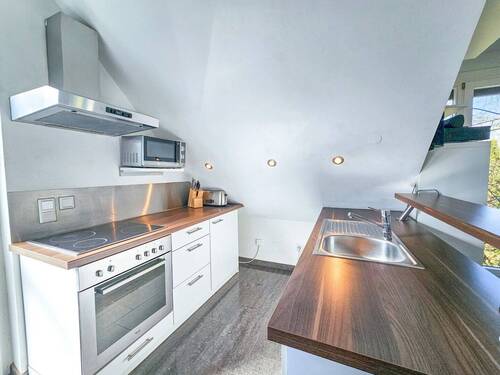 Küche in Wohnung im Nebengebäude - 