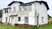 WG 1, Umbau- und Sanierungsobjekt - Mehrfamilienhaus, Wohnhaus mit 300,00 m&sup2; in Middelhagen zum Kaufen