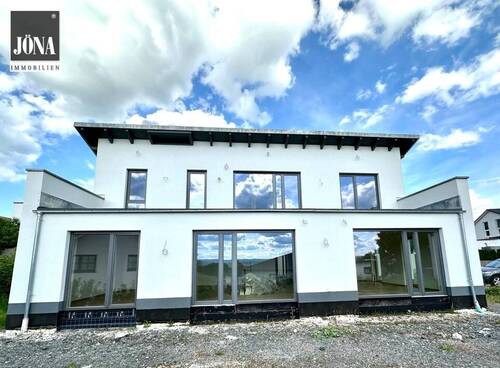 Bild 1 - Architektenhaus mit Fernblick - Erstbezug in exklusiver Wohnlage