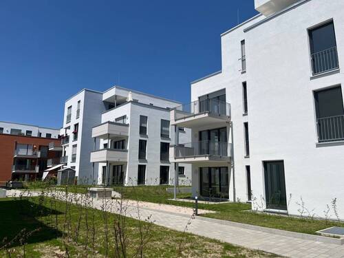 Außenansicht mit Innenhof - 4 Zimmer Etagenwohnung zum Kaufen in Winnenden