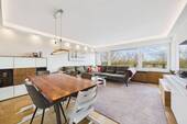 Wohnzimmer - Modernisierte, lichtdurchflutete 3-Zimmer-Wohnung mit Balkon & Tiefgaragenstellplatz in Münster