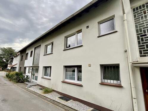 Seitenansicht - Mehrfamilienhaus, Wohnhaus zum Kaufen in Hilden