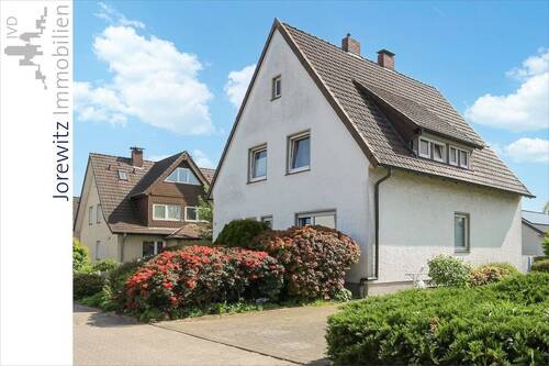 001 - Straßenansicht - Sehr gepflegtes Einfamilienhaus mit schönem Garten und Garage in beliebter Lage in Bi-Jöllenbeck