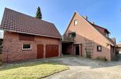 Wohnhaus mit Anbau - 7 Zimmer Einfamilienhaus zum Kaufen in Borstel
