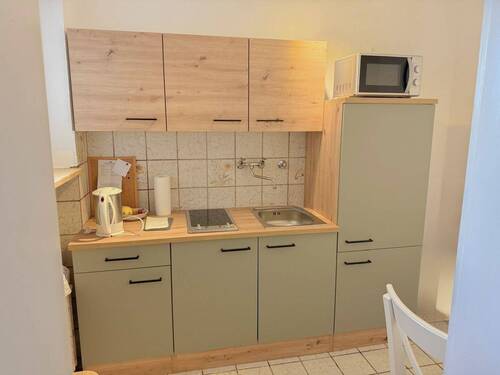 Küche - Gepflegtes und vermietetes 1-Zi.-Apartment zum Innenhof in gut angebundener Lage