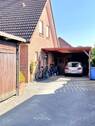 Ansicht mit Carport - 
