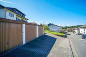 Drei Fertiggaragen - Mehrfamilienhaus, Wohnhaus mit 322,00 m² in Wald-Michelbach / Aschbach zum Kaufen