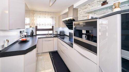 Küche_05 - Attraktive 4,5-Zimmer-Wohnung mit Balkon, hochwertiger Ausstattung und TG-Stellplatz mit Wallbox