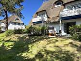 Hausansicht mit Terrasse - 2 Zimmer Etagenwohnung in Zingst