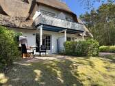Hausansicht mit Terrasse - Etagenwohnung mit 47,80 m² in Zingst zum Kaufen