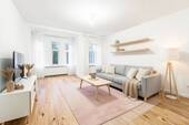 Einrichtungsbeispiel Wohnzimmer - Erstbezug nach Kernsanierung: Moderne 3-Zimmer-Wohnung zentral in Oranienburg mit Einbauküche