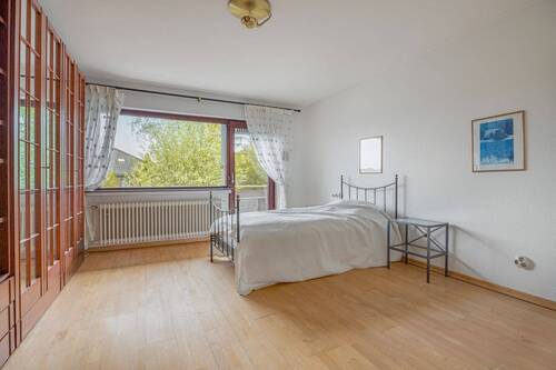 Schlafzimmer mit Balkon - 