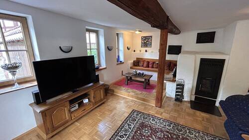 Gemütliches Wohnzimmer mit Kamin - 6 Zimmer Einfamilienhaus zum Kaufen in Reichelsheim / Unter-Ostern