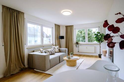 Wohnzimmer - 2 Zimmer Etagenwohnung zum Kaufen in Weilheim