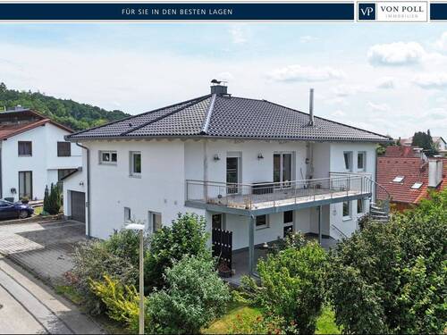 Seitenansicht - Familienfreundliches Wohnen in Gündlkofen - saniert, energieeffizient, vielseitig nutzbar