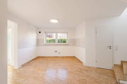 Die_Kuechenzeile - 4 Zimmer Einfamilienhaus in München