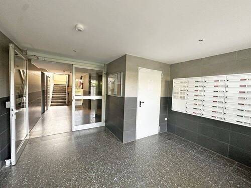 Hauseingang - Etagenwohnung mit 64,00 m² in Glinde zum Kaufen