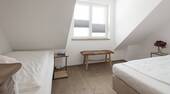 Granat 2 OG Schlafzimmer 1 - 